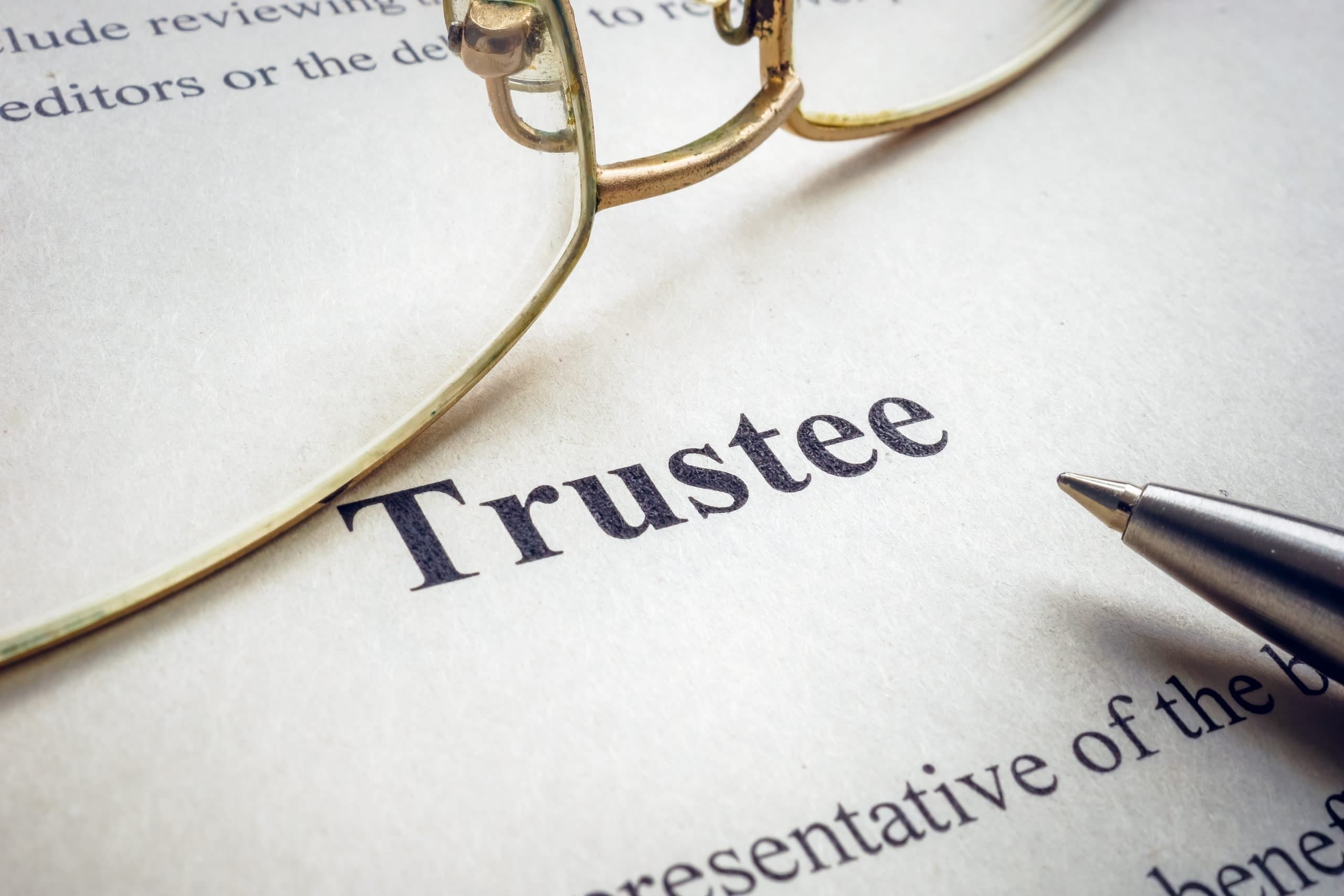 a trustee managing a trust, representing the concept of community property in estate planning