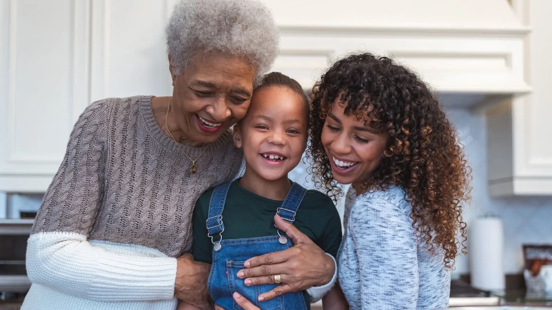 Grandpa and grandchildren having a good time at home