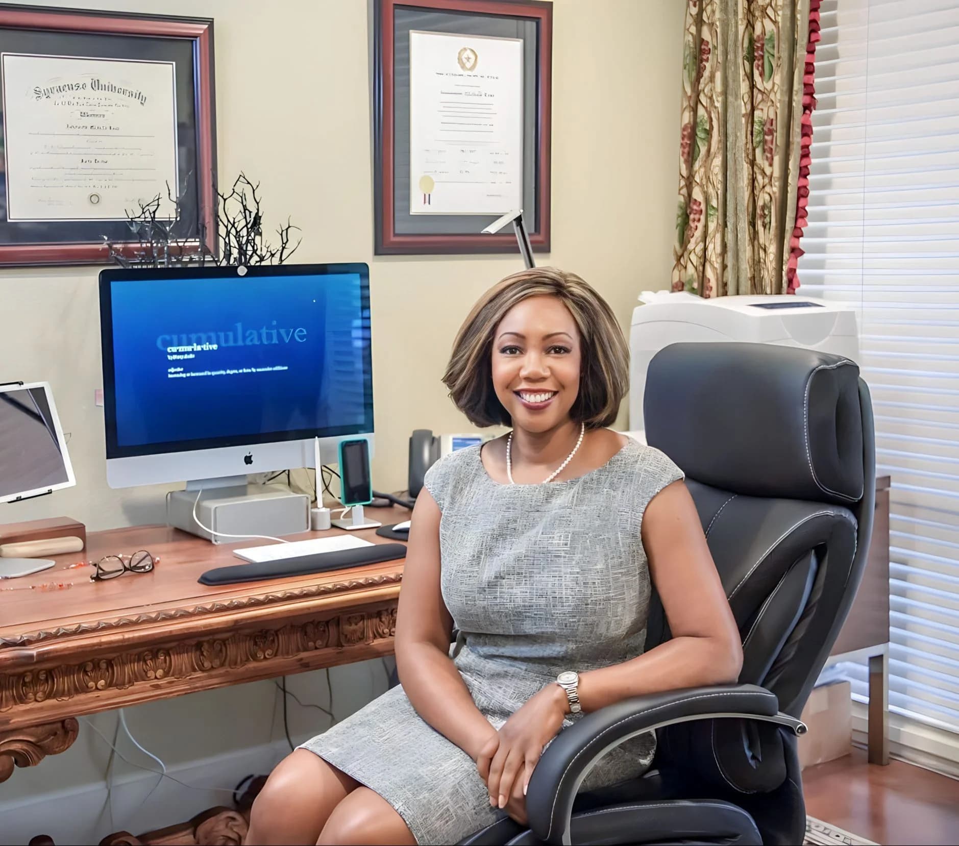 Antoinette at her desk